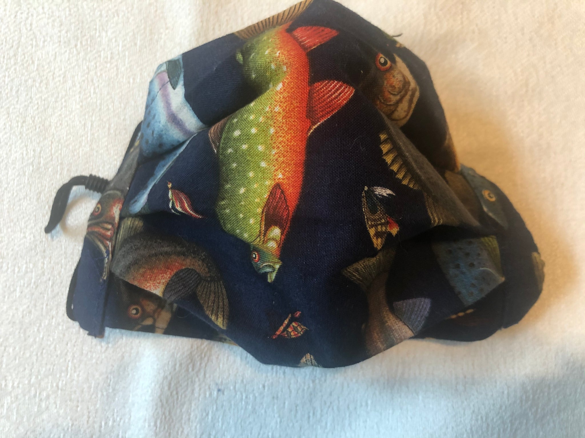 Swimming Downstream Fish, nose wire, filter pocket, adjustable ear ties
